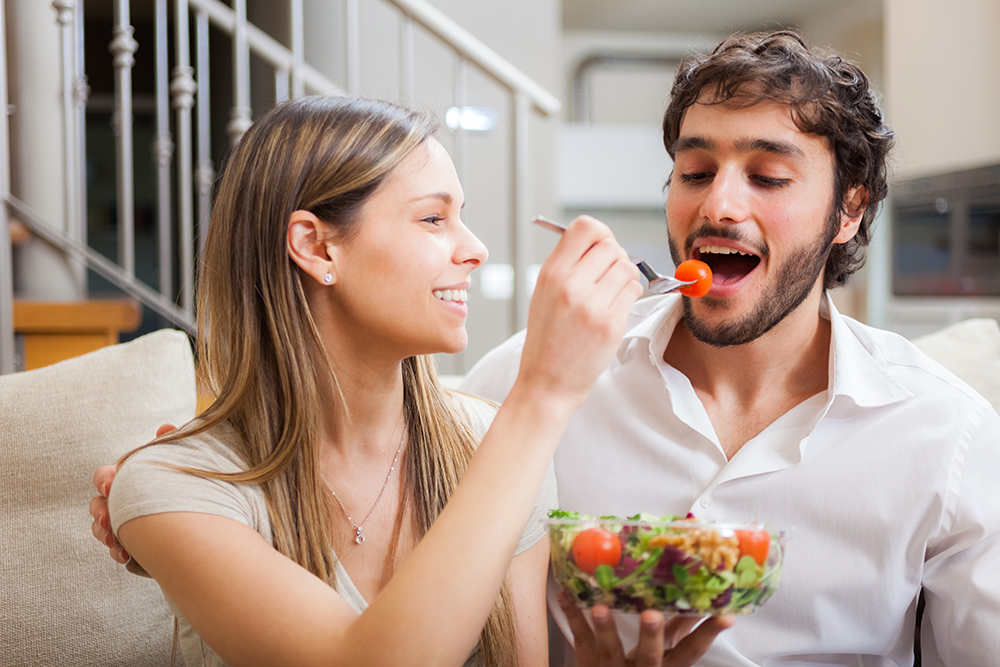 couple eating salad